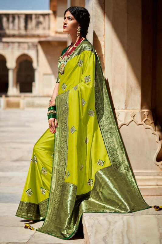 Light olive green color paithani silk saree with zari weaving work