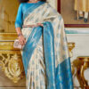 white and blue saree