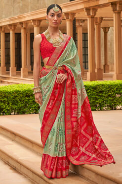 red and green patola saree